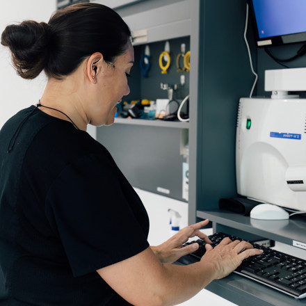 Image of medical professional typing